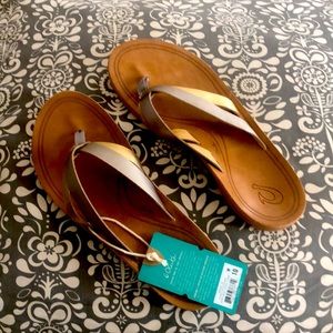OluKai flip flops. Purchased at Tommy Bahama store. Size 10. New with tags.